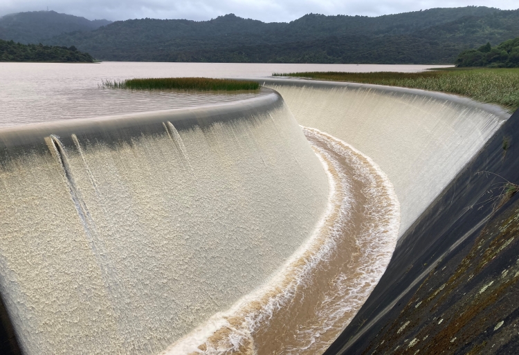 Lower Nihotupu dam after the storm