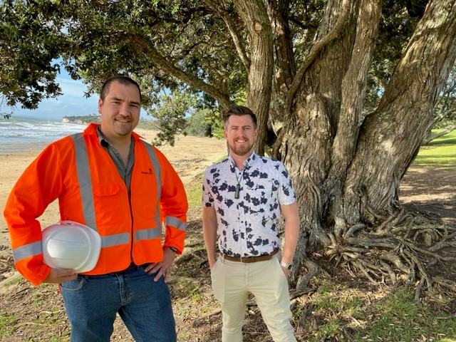 Photo of Watercare project manager Johan Gerritsen and Auckland Councillor Richard Hills at Takapuna Beach